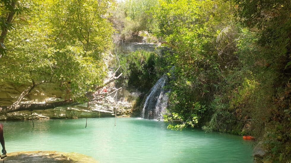 Sights to see in Cyprus: beautiful green Adonis waterfalls with green foliage