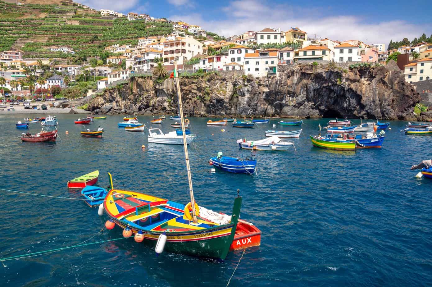 Colorful boats in the water in Madeira.