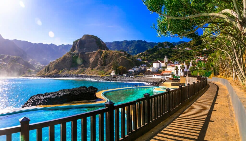 A wooden walkway leading to a beach on the island of Madeira