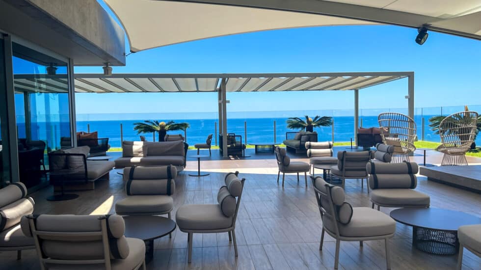 Where to stay in Madeira: An outdoor lounge area with a view of the ocean.