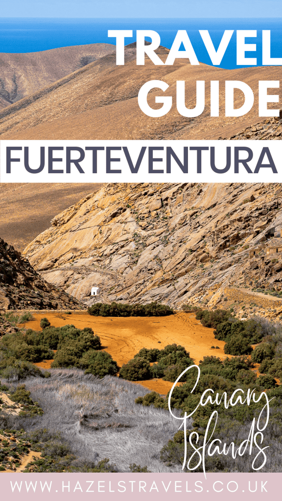 Cover of a Fuerteventura travel guide, showing a rocky landscape with sparse vegetation and a small building. Text: "Travel Guide Fuerteventura, Canary Islands". Website: www.hazelstravels.co.uk.