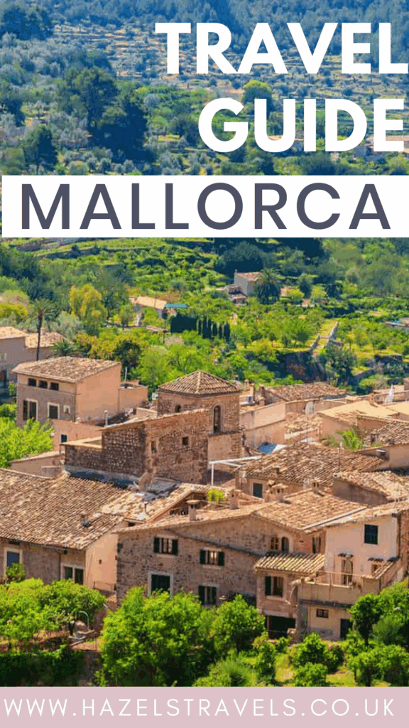 Picturesque village in Mallorca with traditional stone houses and lush greenery, with the text Mallorca Travel Guide - suitable for Pinterest pinnning.